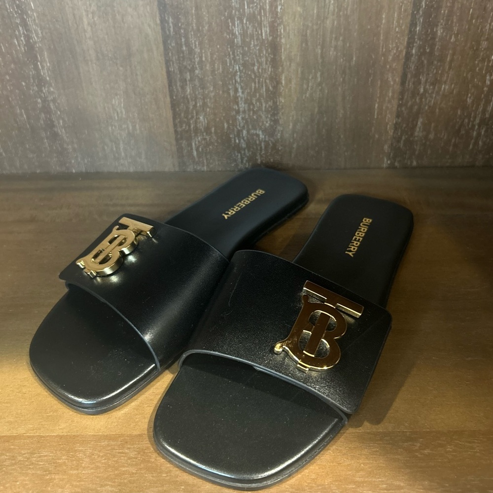 Burberry Black Slides with Gold Logo